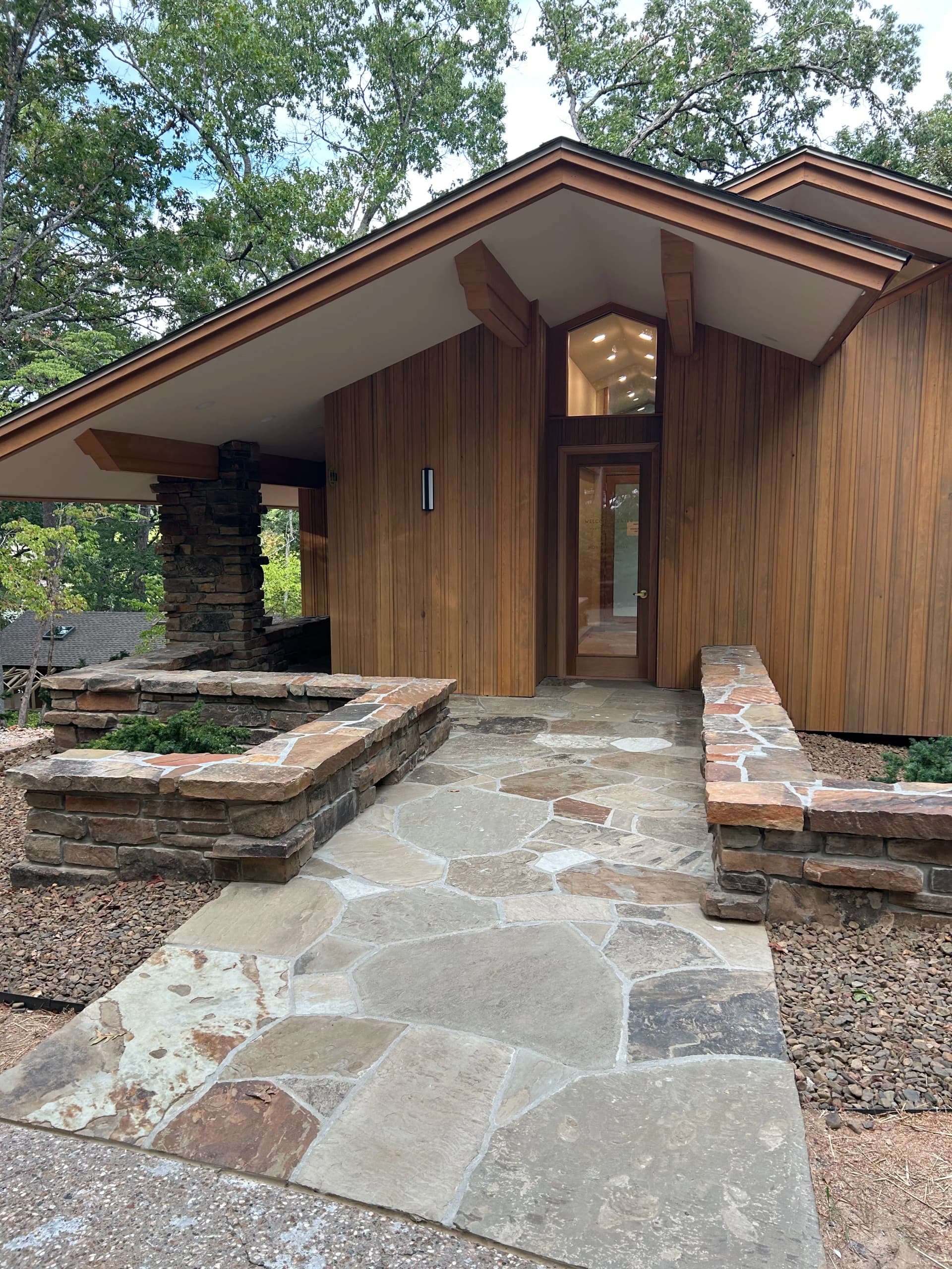 Native Stone Walls, Columns, and Flagstone at a Bella Vista Home image