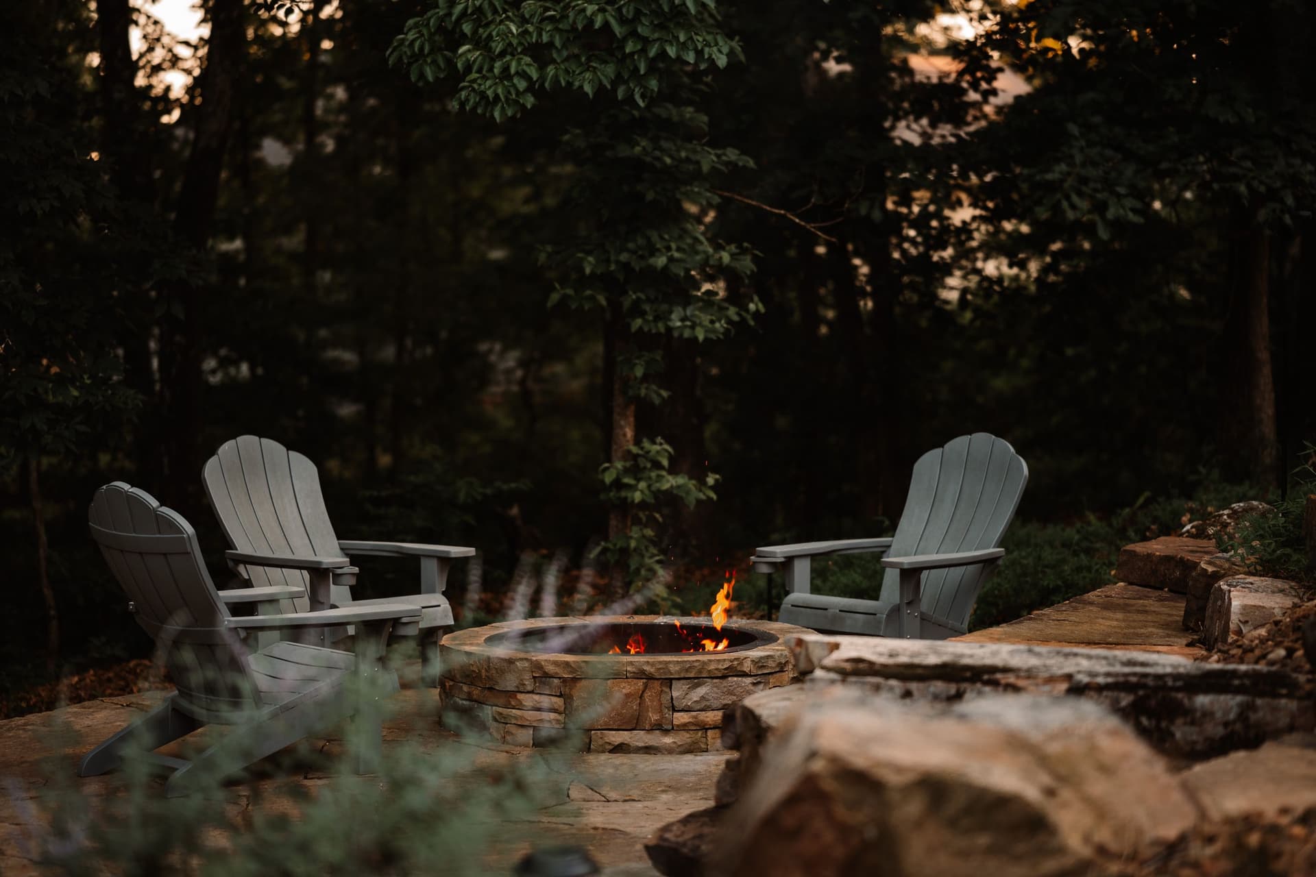 Rustic Stone Fire Pit Enhances Outdoor Living