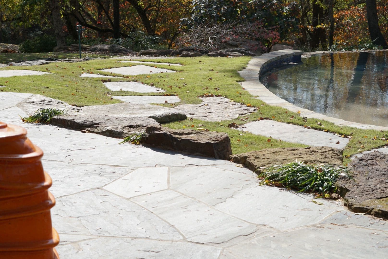 Stone Patio and Poolside Elegance in Bentonville
