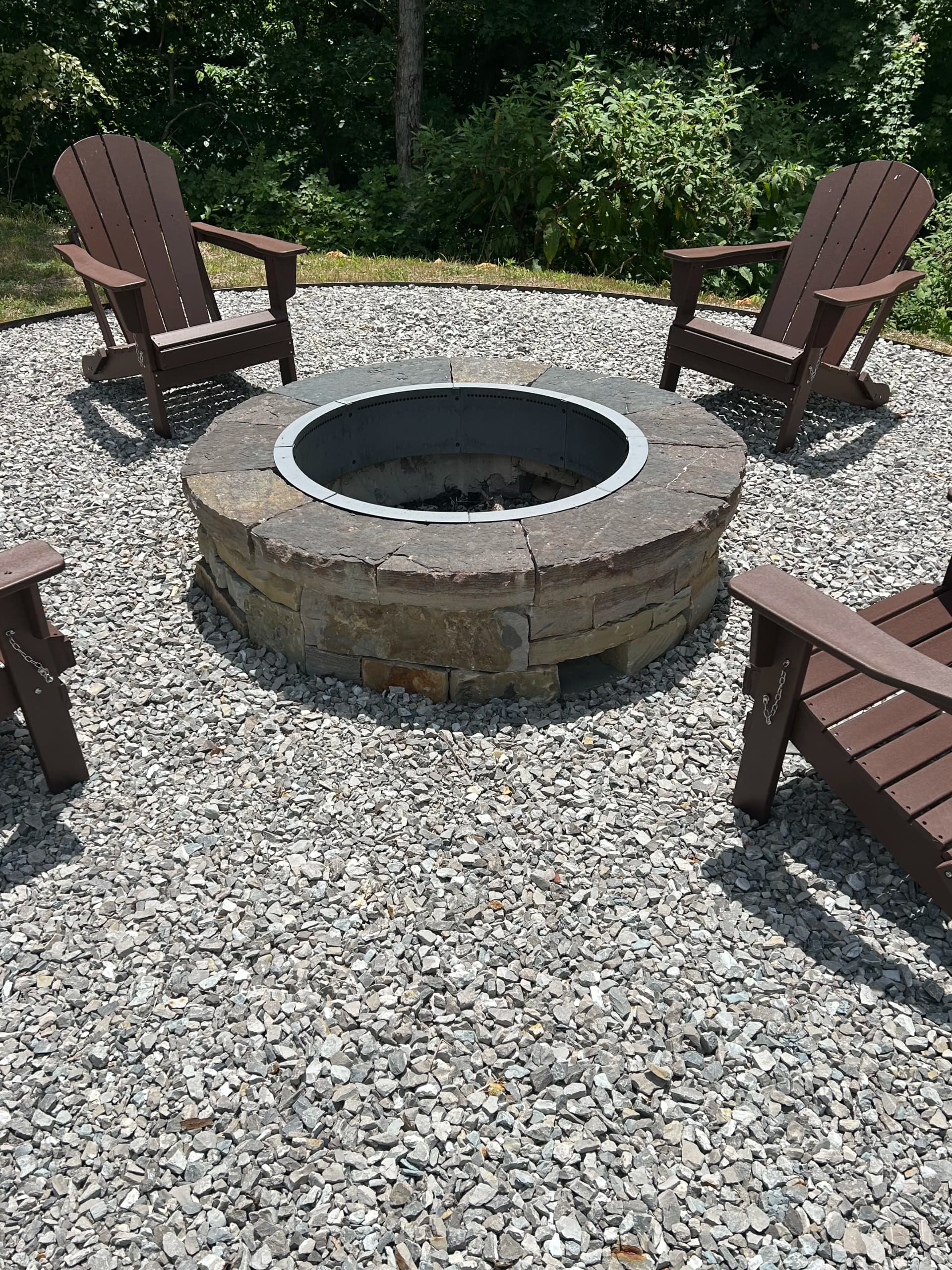 Stone Fire Pit with Gravel Seating Area That Actually Lasts image